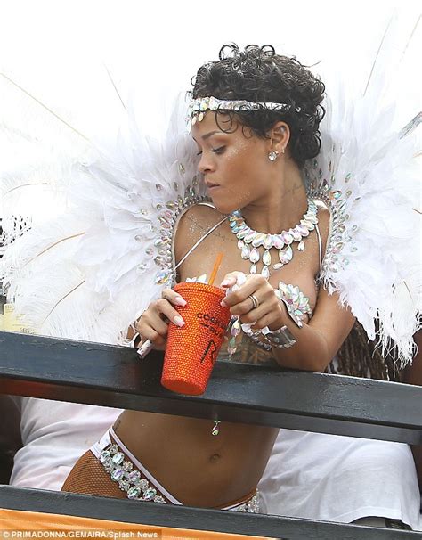 rihanna sips hip flask and dances in bejewelled bikini at barbados carnival daily mail online