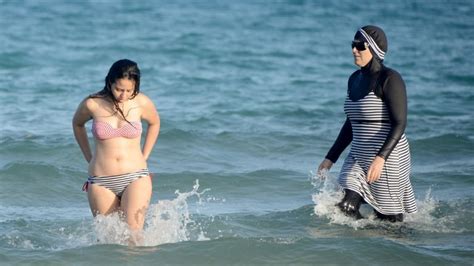 french towns ban muslim women s beach burkini the times of israel