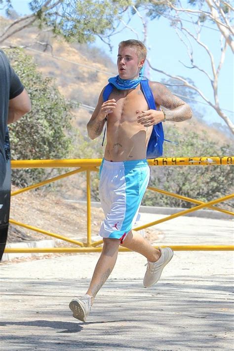 justin bieber takes a shirtless jog amid sex tape rumours with