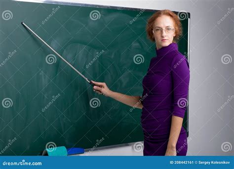 Teacher Standing In Front Of Blackboard Stock Image Image Of