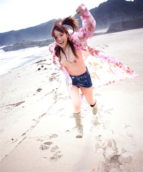 honey japanese teen yu namiki strips naked on beach