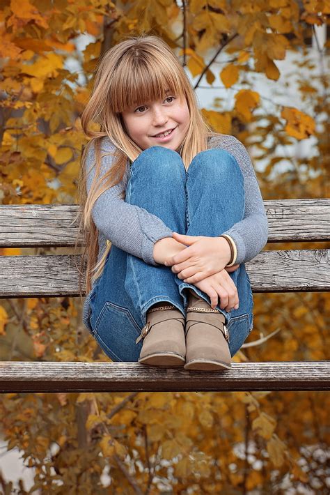 Royalty Free Photo Girl Sitting On Brown Bench Pickpik