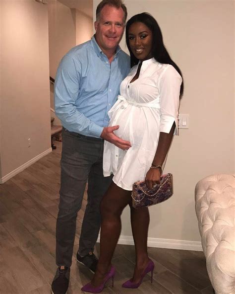 gorgeous interracial couple having a hot date before the birth of their