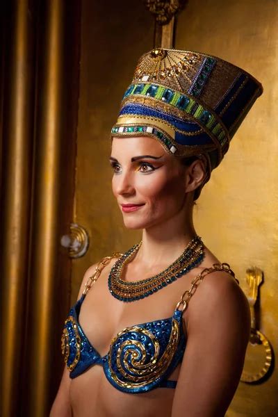 Sexual Beautiful Egypt Woman On The Huge Golden Gates Background Stock