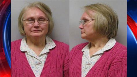 72 year old woman charged with shooting her husband in face