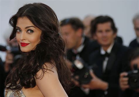 aishwarya rai makes dazzling appearance in gold at cannes