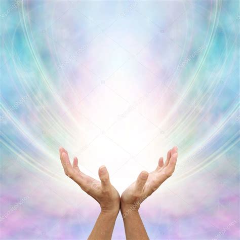 receiving divine source healing hands cupped facing white light blue stock photo  healing