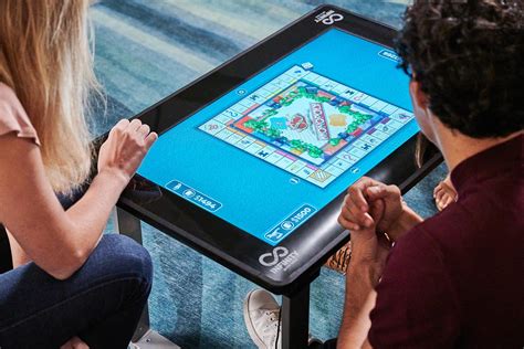 touchscreen table packs dozens  digital board games  puzzles