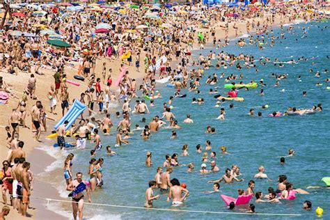 spanish authorities cracking down on people saving beach spots with