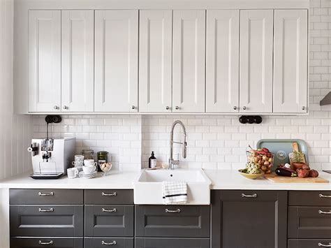 white upper cabinets dark  cabinets transitional kitchen