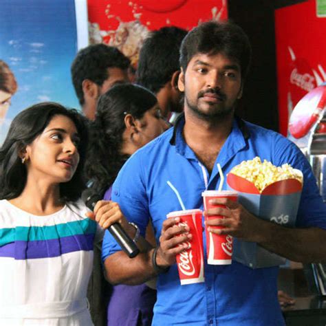 niveda thomas and jai in a still from the tamil movie naveena