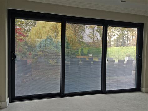 smart visoglide  triple track sliding door complete  integral blinds   sealed