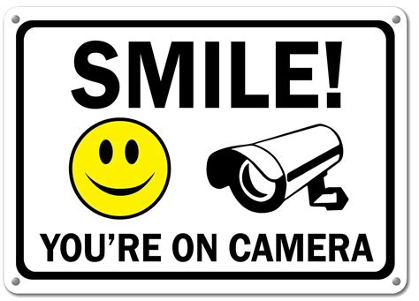 smile youre  camera sign yellow smile face plastic   rust