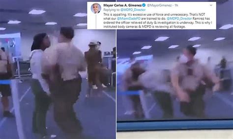Shocking Moment Police Officer Punches A Woman At Miami Airport Daily