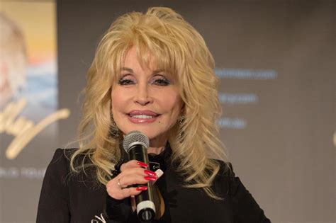 what has dolly parton said about cosmetic surgery and wearing a wig