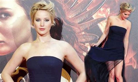 jennifer lawrence flashes her pins in sexy sheer dress at madrid premiere of catching fire