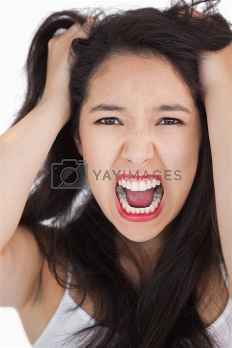 Woman Screaming And Pulling Her Hair Out By Wavebreakmedia Vectors