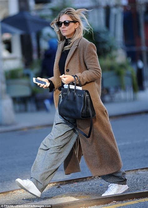 Sienna Miller Keeps It Casual In Knitted Coat In Nyc