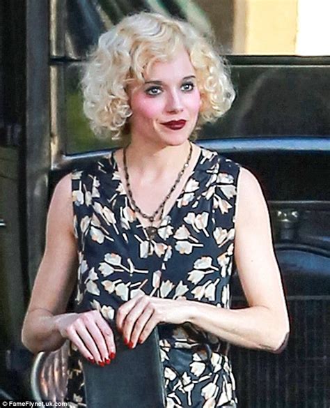 sienna miller stuns wearing vintage dress filming live by night with