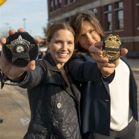 women   selfie   police badge