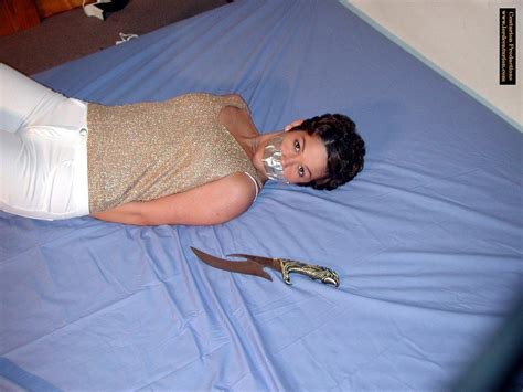 good old bondage photos damsel in peril handcuffs and tapegag fetish porn pic