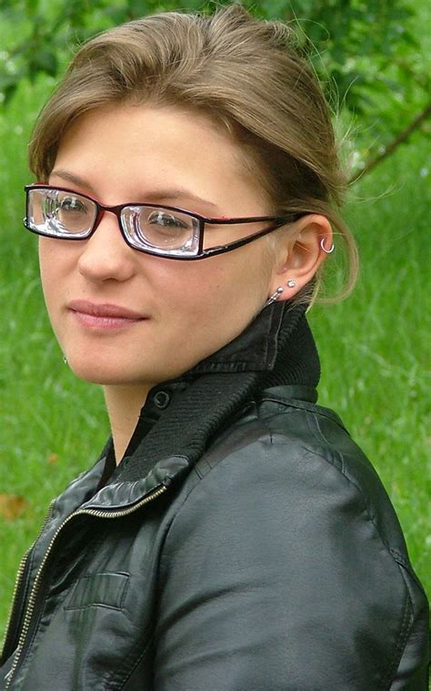 cute brunette girl wearing split arm glasses with super