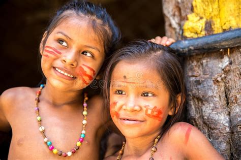 native brazilian girls at an indigenous tribe in the amazon stock image image of happy person