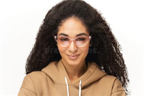 Gorgeous 20s Multiracial Lady Wearing Glasses Looks At The Camera With