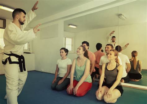 Karate Coach Teaching Adults Photos By Canva