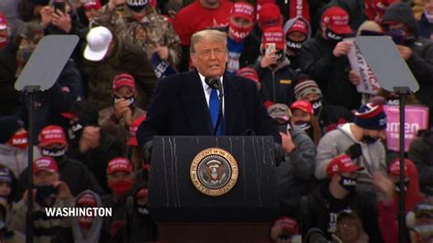 Trump Campaigns At Rain Soaked Michigan Rally