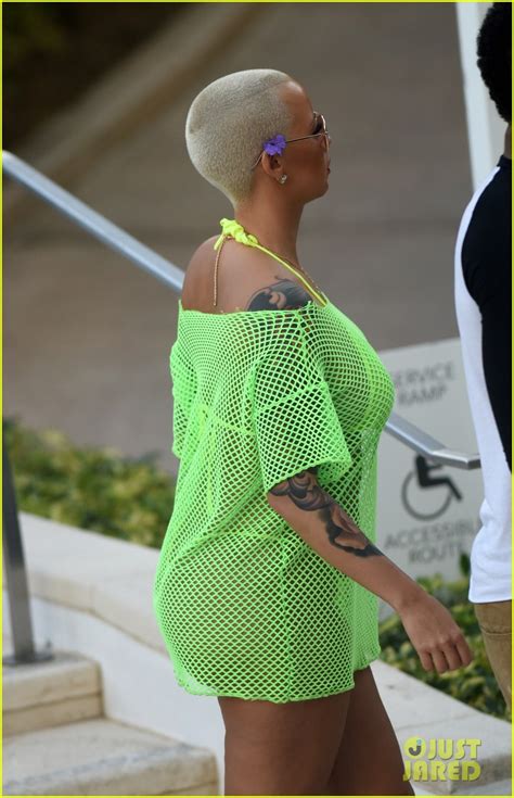 amber rose wears two very sexy string thong bikinis in miami photo