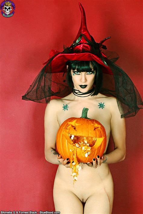 alt babe asphyxia carving a pumpkin for halloween 1 of 1