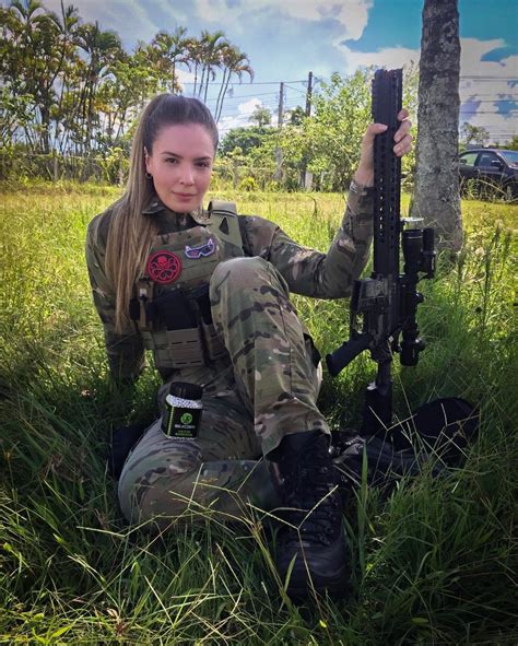 Pretty Teen Admires To Play Paintball In Military Uniform