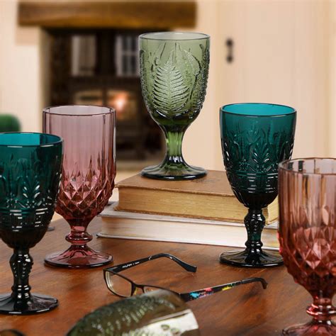 set of four vintage embossed coloured wine glasses by