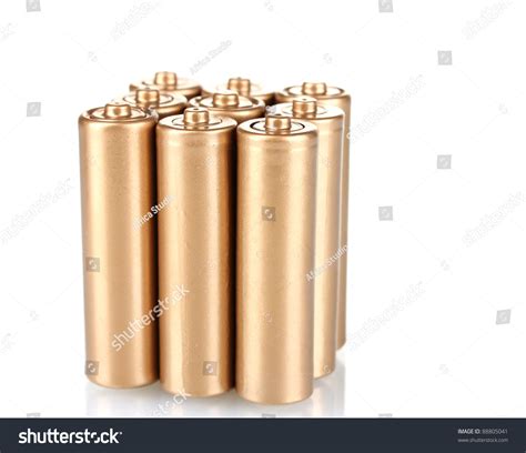 golden batteries isolated  white stock photo  shutterstock