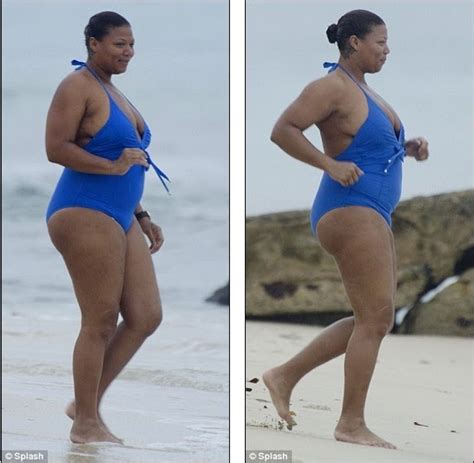 curvy queen latifah busts out of an unflattering swimsuit