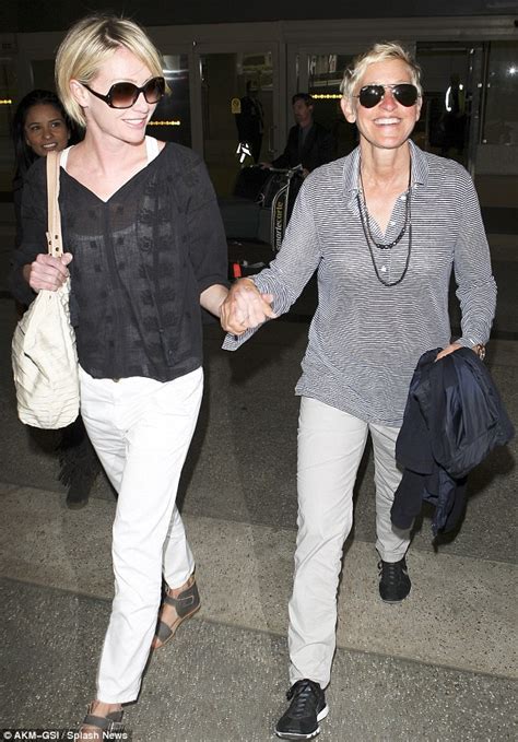 Ellen Degeneres And Portia De Rossi Hold Hands As They Shrug Off Jet