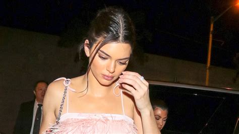 kendall jenner proves why a tiny crop top and killer abs are a girl s