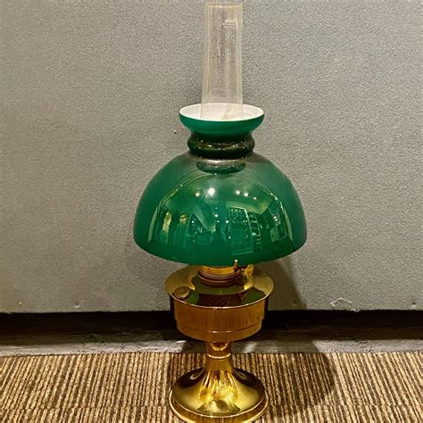 mid 20th century oil lamp with green glass shade antique lighting