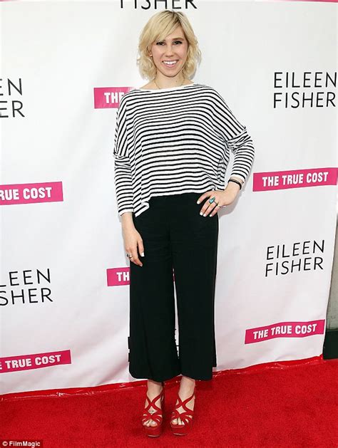 zosia mamet hides her figure in baggy blouse at the true cost premiere