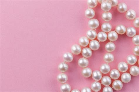 pearl background  nacreous pearl necklace  pink background