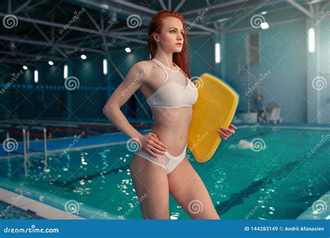 beautiful young woman   indoor swimming pool athletic girl stock image image  board