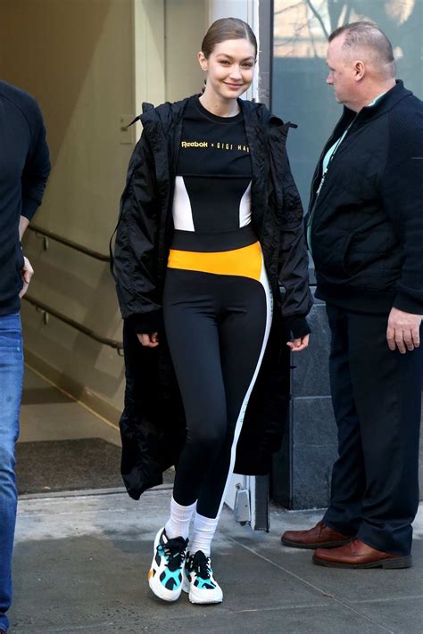 gigi hadid is all smiles while exiting a reebok x gigi hadid event in