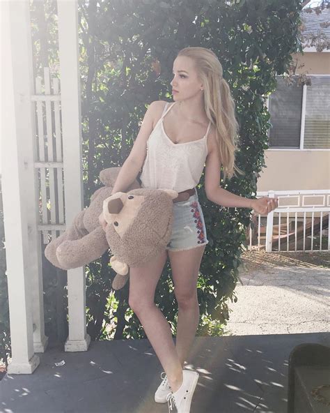 dove cameron has a stuffed bear undercover of the night