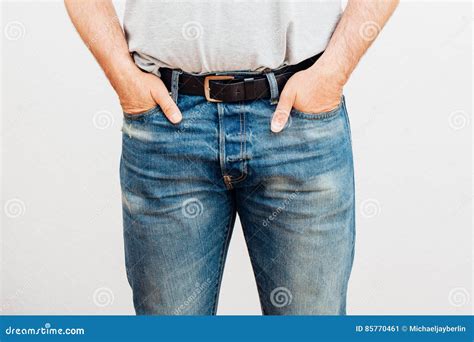 Man With Hands Tugged In Blue Jean Stock Image Image Of Shot Jeans