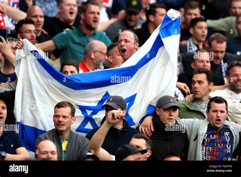ajax fans hold  israel flag   stands   champions league semi final  leg