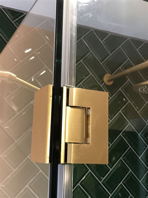 open door   handle   glass  front   tiled wall  floor
