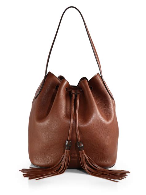 gucci lady tassel leather bucket bag  brown lyst