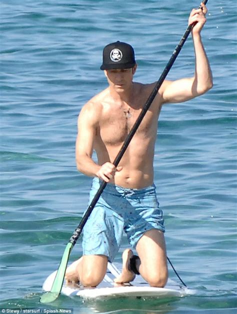 dylan mcdermott shows off his muscular physique on beach break daily