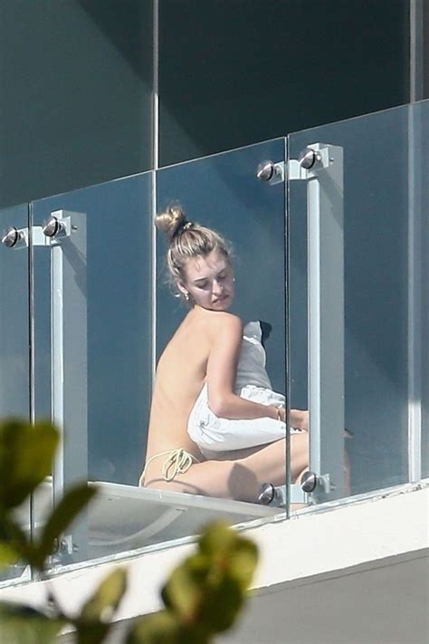 roosmarijn de kok topless sunbathing on her balcony 24 photos the